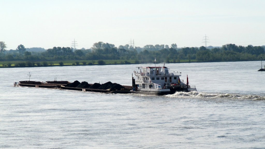 SB Herkules VII der Imperial-Reederei , 04028330 , 35 x 13 , schiebt am 18.05.2012 vier Schubleichter kurz hinter Rees auf dem Rhein zu Berg. 