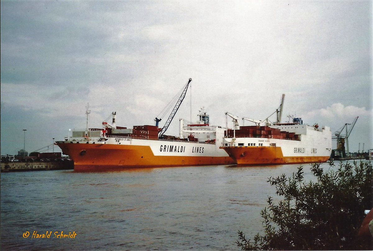 GRANDE NIGERIA (IMO 9246580) und REPUBBLICA DI AMALFI (IMO 8521218) im Mai 2006, Hamburg,  Hansahafen (scan Vom Foto)  / 

GRANDE NIGERIA (IMO 9246580)

RoRo / ConRo-Schiff / BRZ 56.738 / Lüa 214 m, B 32,2 m, Tg 9,4 m / 1 Diesel , Sulzer,  8TRA 62U, 18.200 kW (24.752 PS), 19,7 kn / 1321 TEU, 3450 Kfz / gebaut 2003 bei Fincantieri-Cantieri Navali Italiani S.p.A, Ancona, Italien /  Eigner: Industria Armamento Meridionale S.p.A. (INARME)
Palermo, Italy, Operator: Grimaldi Lines,Neapel, Italien / Flagge: Italien, Heimathafen: Palermo /                    

REPUBBLICA DI AMALFI (IMO 8521218) / 
Weiterer Name: JAI BHOLE (Abbruchname) /
RoRo / ConRo-Schiff / BRZ 42.574 / Lüa 216,1 m, B 30,4 m, Tg 9,4 m / 1 Diesel , Sulzer,  8TRA 58, 12.710kW (17.286 PS), 19 kn / 1116 TEU davon 40 Reefer, 3450 KfZ / gebaut 1989 bei Fincantieri-Cantieri Navali Italiani S.p.A, Italien /  Eigner: Industria Armamento Meridionale S.p.A. (INARME), Palermo, Italy, Operator: Grimaldi Lines, Neapel, Italien / Flagge: Italien, Heimathafen: Palermo / 10.2012 JAI BHOLE, 2012 Abbruch in Alang /
