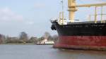 Die Fähre Kudensee und der Stückgut- und  Containerfrachter Luxury SW (IMO: 9198379) Panama auf der Fahrt nach Kiel im NOK. Fotografiert  am 04.04.2011.