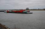 Talwrts kommt der Containerfrachter MS Jordy M an Emmerich vorbei gefahren am 6.2.2011 in Richtung Niederlande.