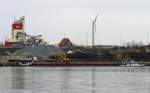Das polnische Binnenschiff NAWA 9, ENI 8348096 hat mit seiner Ladung Httensand den Zielhafen in Lbeck am Lehmannkai 3 erreicht... Aufgenommen: 2.3.2012