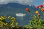 Das Motorpassagierschiff  Ville de Genve  erreicht in Krze die Anlegestelle Montreux.