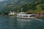 Schweiz - Noch ein Foto mit dem Teleobjektiv auf die MS Europa, die nach einem Stopp in Vitznau am Vierwaldsttter See, ihre Fahrt nach Luzern ohne Hektik fortsetzt.