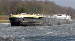 TMS Somtrans XVI, ENI 02332526, fhrt am 10.02.2012 auf dem Rhein-Herne-Kanal bei Duisburg-Meiderich durch dnnes Treibeis. Lnge: 110,00 m, Breite: 11,45 m, Tiefgang: 3,20 m, Tonnage: 2690 t.