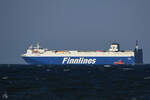 Das Fährschiff FINNMILL (IMO: 9212656) ist hier auf der Ostsee zu sehen. (Priwall, März 2022)