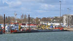 DBB ASTERIX (IMO 9878125) am 25.02.2023 im Hafen von Lübeck-Travemünde. Das rund 24 Meter lange Seefahrzeug ist zurzeit im Einsatz, um mit Baggergut von der Baustelle Skandinavienkai gefüllte Bargen in die Lübecker Bucht zu bringen, wo das Baggergut verklappt wird.