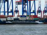 TMS Zaria (02334940 , 86 x 11,45) am 03.07.2014 beim Bebunkern eines Container-Feeders am Burchardkai im Hafen HH