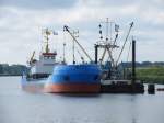 Sonstige Die Baggerschute Zingst hat am Sp�ler Roland IV festgemacht. Dieser lag an den Dalben der Sp�lerstelle Karlshagen am 06.08.09.