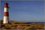 Sylt Das Leit-, Quermarken- und Orientierungsfeuer Sylt Ost ist wie Sylt West seit dem 01.01.1958 in Betrieb. Beide T�rme stehen auf dem sogenannten Ellenbogen im Norden der Insel Sylt. Scan eines Dias vom 08.12.2004.
