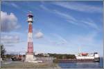 Nord-Ostsee-Kanal Das s�dliche Einfahrtsfeuer zu den Holtenauer Schleusen des NOK wird am 03.10.2005 von dem wohl als K�mo zu klassifizierenden Schiff AMUR-2511 passiert. Die 1986 gebaute AMUR-2511 hat bei einer L�nge von 115,8 m und einer Breite von 13,43 m eine GT von 3086. Ihr Heimathafen ist Kaliningrad.