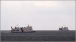 Die F�hrschiffe UTHLANDE (links) und RUNGHOLT der Wyker Dampfschiffs-Reederei am ...