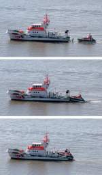 Der Seenotkreuzer HERMANN RUDOLF MEYER nimmt sein Tochterboot CHRISTIAN nach ... Der Seenotkreuzer HERMANN RUDOLF MEYER nimmt sein Tochterboot CHRISTIAN nach ...