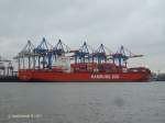 SANTA TERESA (IMO 9430375) am 18.1.2013, Hamburg, Elbe, Stromliegplatz Athabaskakai /
Containerschiff / BRZ 72.500 / La 300,9 m, B 40 m, Tg 13,5 m / 1 12-Zyl.-Diesel,  MAN B&W 12K98MC-C, 68.520 kW, 25 kn / TEU 7.090 , Reefer 1.365 /  2011 bei Daewoo,  Goeje, Sdkorea / Eigner + Manager: Columbus Shipmanagement, Hamburg (Hamburg-Sd), Flagge: Liberia, Heimathafen: Monrovia / 
