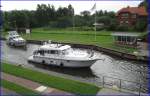 Motoryacht ISABELLA MMSI 126568857, Rufz.: SE3279, aus Schweden im Elbe Lbeck Kanal in der Bssauer Schleuse um 1,75m hochgeschleusst.
