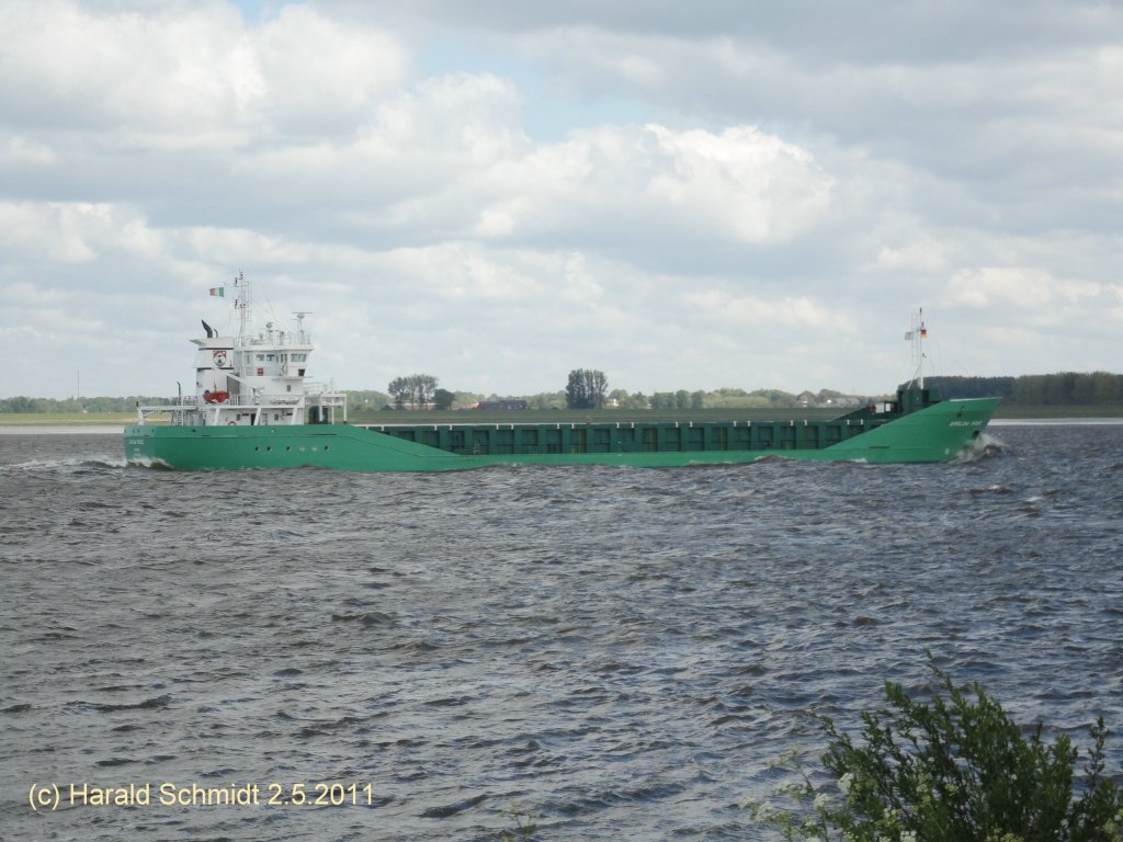 ARKLOW ROGUE   IMO 9344526 am  2.5.2011 auf der Elbe Hhe Lhe / 
GT 2999 / La: 89,99 m, B: 14,18 m, Tg. max. 5,68 m / 1 MaK 6M25, 1499 kW, 11,5 kn / / TEU 102 2007 bei Barkmeijer Stroobos, Holland / Flagge: Irland, Heimathafen: Arklow /
