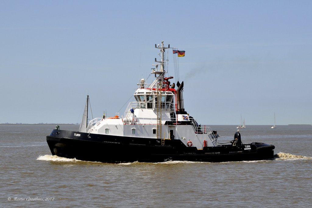 Der URAG-Schlepper  Turm  am 2.06.2011 auf der Weser vor Bremerhaven.
L: 33,5m / B: 12,5m / 3744 kw / 13 kn / 452 BRZ / Bj: 2001 / Pfahlzug: 54 t / Heimathafen Bremen / Flagge Deutschland