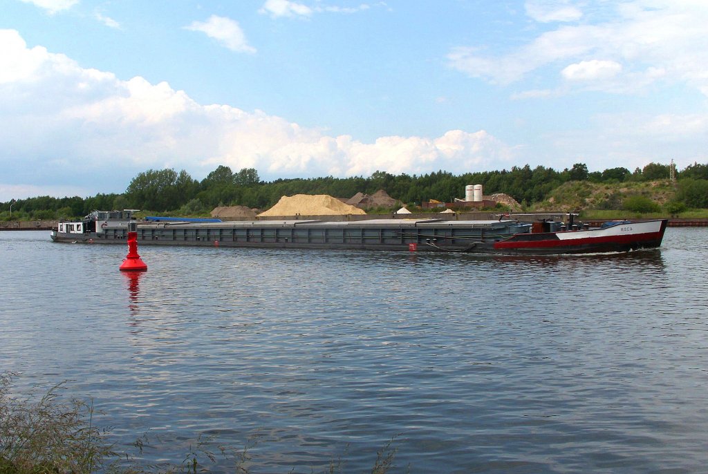 GMS MOCA, ENI 04016490, hier traveabwärts mit einer Ladung Dünger für Burmann in Lübeck-Schlutup...  Aufgenommen: 22.6.2012