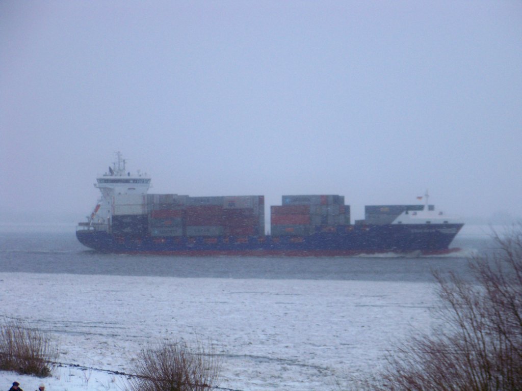 Ich kan nicht viel sehen, aber auf jeden Fall ist dies ein Containerschiff.