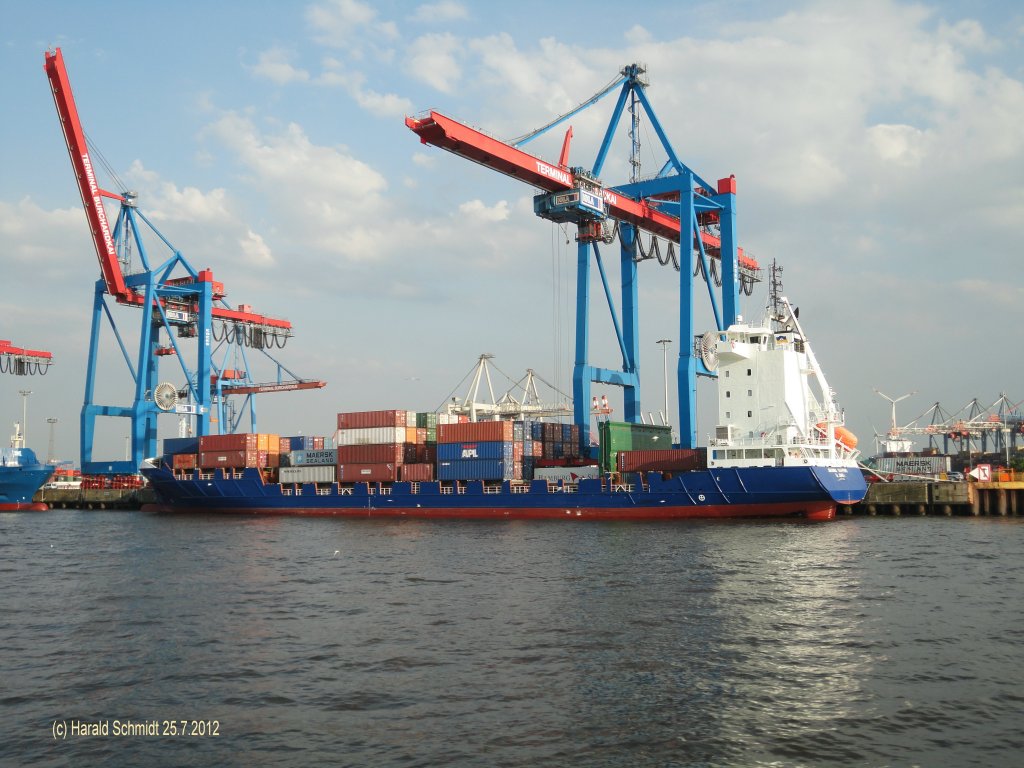 JOHANNA SCHEPERS (IMO 9436305) am 25.7.2012, Hamburg, Elbe, Container Terminal Burchardkai, Liegeplatz Athabaskakai /
ex MEREL (bis 06.2011)
Feeder / BRZ 7852 / La 141 m, B 22 m, Tg 5,5 m / 1 Diesel MaK 9M 43, 8400 kW, 18 kn /TEU 800 davon 210 Reefer / 2009 bei Damen Werft GORINCHEM, Niederlande/ Eigner + Manager: Hs Schiffahrt,  Haren Ems, Deutschland / Flagge: Antigua + Barbuda /
