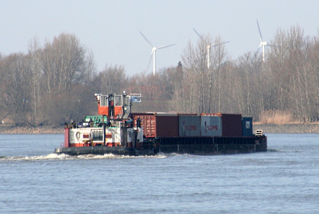 Schubboot Walter ? mit Container-SL am 20.03.2011 auf der Elbe zu Tal im Bereich Wraust - gehrt zum Stadtgebiet HH.