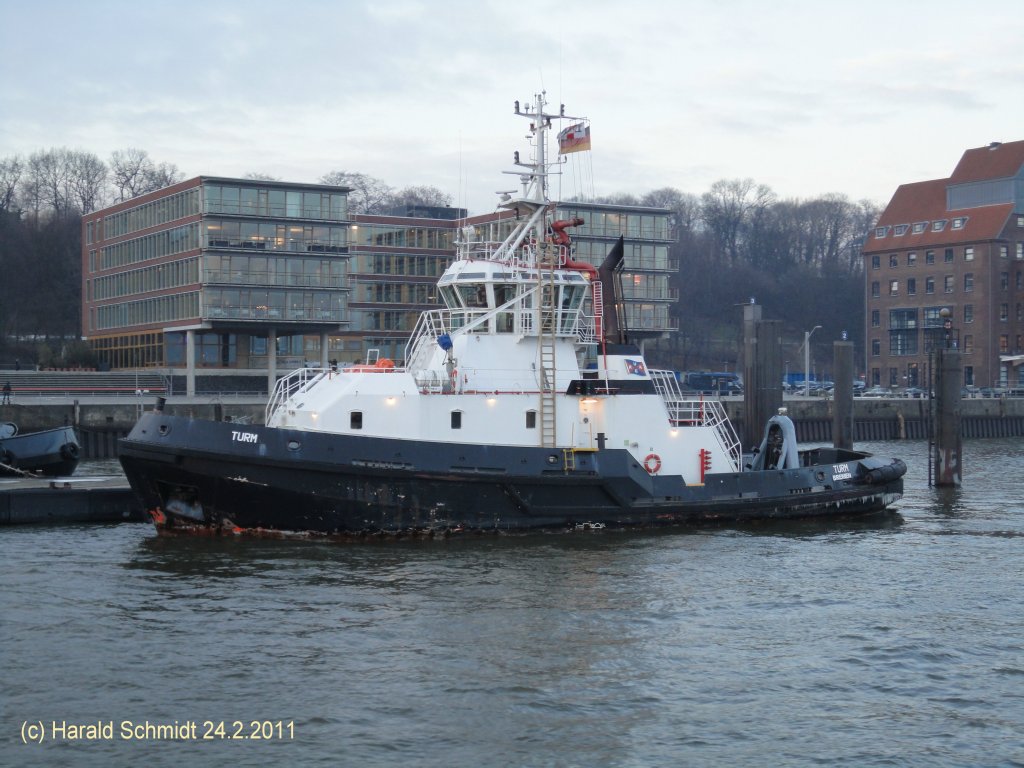 TURM  IMO 9211212 am 24.2.2011, Hamburg, Schlepperponton Neumhlen / 
Eigner: Ltgens & Reimers, Hamburg, Bereederung: URAG, Bremen / Heimathafen: Bremen, Flagge: Deutschland / 
Schlepper / 2001 bei Astilleros Armon, Navia, Spanien / BRZ 457 / La 32,5 m, B 11 m, Tg 2,65 m / 3.742 kW, 13 kn, Pfahlzug 54 t / 
