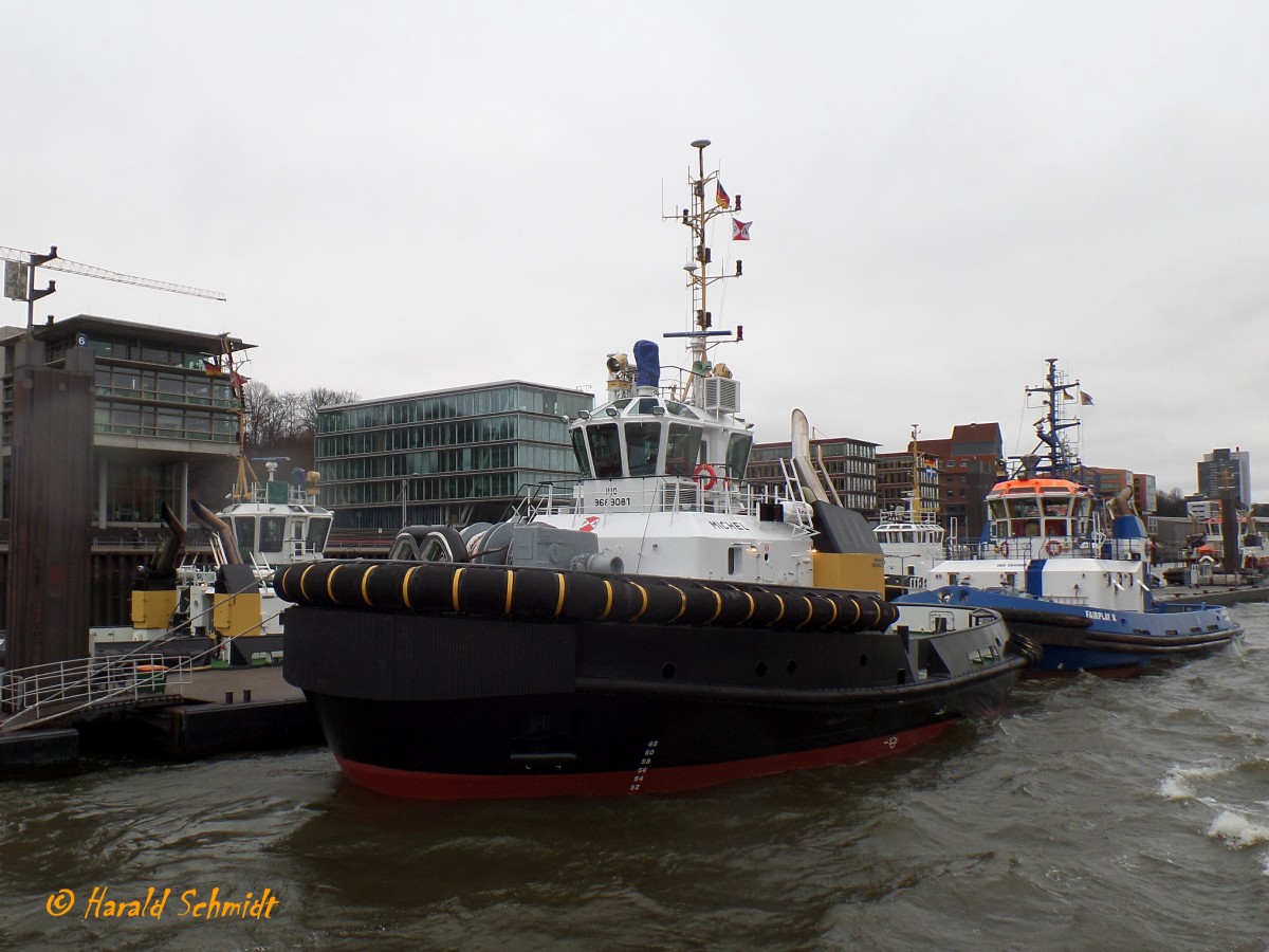 MICHEL (4) (IMO 9689081) am 21.2.2015. Hamburg, Elbe, Schlepperponton Neumühlen /
Doppelhüllen-Assistenz-Schlepper / Typ:  Damen ASD 2913 /  Lüa 28,9 m, B 13,23 m, Tg 5,4 m / 2 Diesel, Caterpillar 3516 C HD+TA/D, ges. 5.050 kW, 6.772 PS, 2 Rolls Royce Ruderpropeller US 255 FP, Prop. Ø 2,8 m,  Pfahlzug bis zu 80,3 t / Eigner: Petersen & Alpers (P&A), Hamburg  / 8.2.2015 einlaufend Hamburg, , 11.2.2015 Übernahme durch die Reederei / dieser Schlepper ist eine Neuntwicklung, P&A hat viele seiner Erfahrungen mit in diesen neuen Typ eingebracht und bekam das erste Schiff dieser Serie. Der Einsatz wird hauptsächlich im Hamburger Hafen und im Bereich Unterelbe sein. Der Neubau ist der stärkste Schlepper, der je für P&A gebaut wurde.
