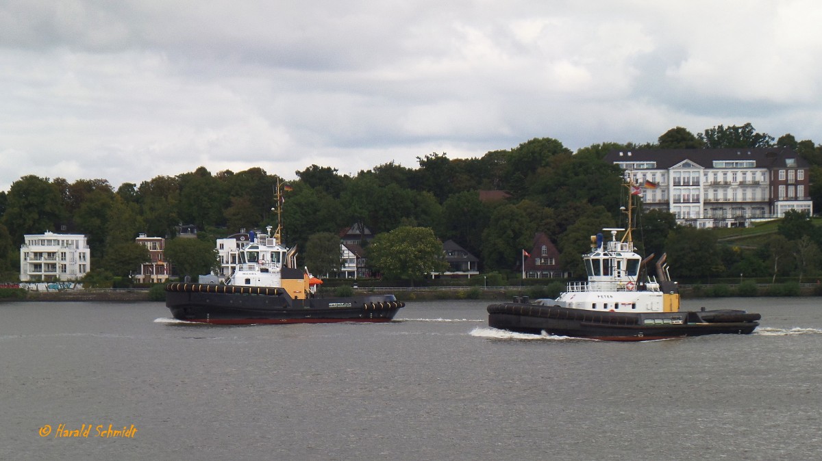 PETER (IMO 9445863) und MICHEL am 8.9.2015, Hamburg, Elbe Höhe Övelgönne / PETER / ASD-Schlepper, Damen ASD 2411 / BRZ 258 / Lüa 25,92 m, B 11,34 m, Tg 5,85 m / 2 Diesel, Caterpillar 3516B TA HD/D, 4.180 kW, 5.683 PS, zwei Azimuth) Rolls-Royce Aquamaster US 255, Propeller D = 2,6 m, 12,5 kn, Pfahlzug: 70,3 t / 2008 bei Damen Shipyard, Netherland (gebaut Haiphong, Vietnam) / 
MICHEL / Doppelhüllen-Assistenz-Schlepper / Typ:  Damen ASD 2913 /  Lüa 28,9 m, B 13,23 m, Tg 5,4 m / 2 Diesel, Caterpillar 3516 C HD+TA/D, ges. 5.050 kW, 6.772 bhp, 6.866 PS, 2 Rolls Royce Ruderpropeller US 255 FP, Prop. Ø 2,8 m,  Pfahlzug bis zu 80,3 t /  für beide Schlepper: Flagge: Deutschland, Heimathafen: Hamburg / Eigner: Petersen & Alpers, Hamburg / 