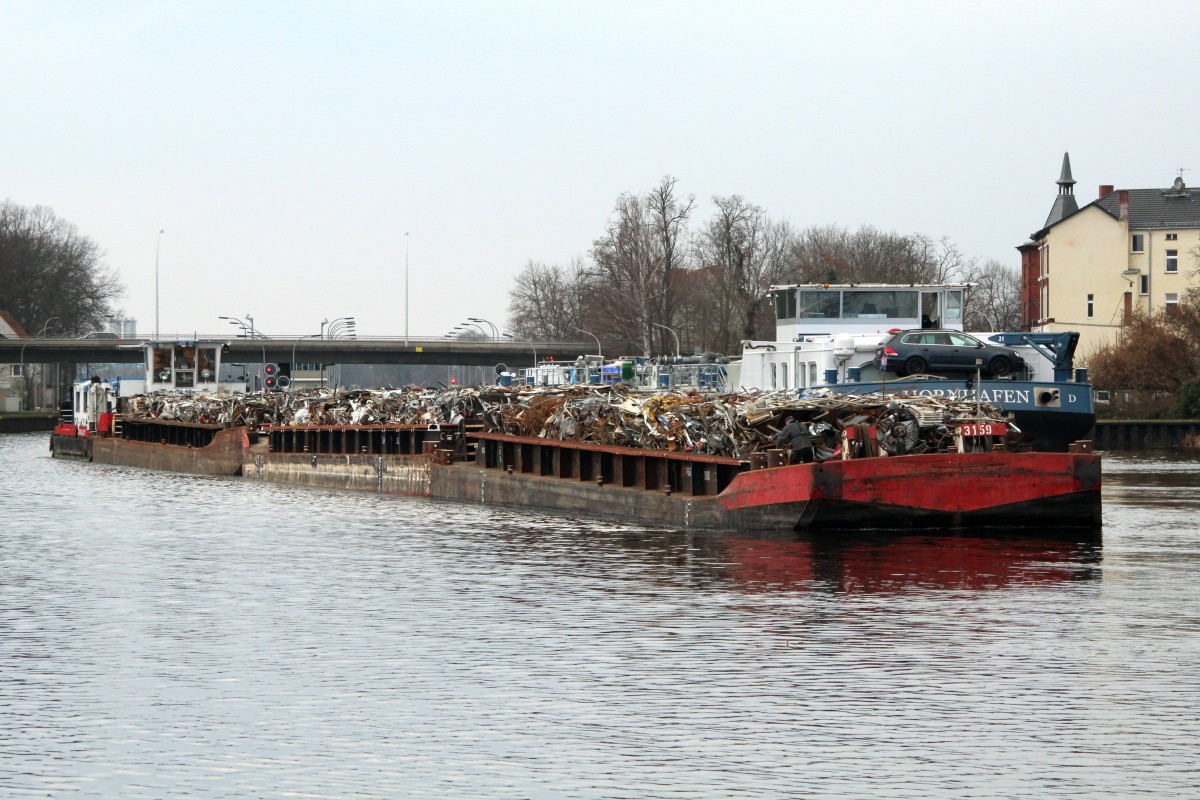 Schubverband mit 3 beladenen Schubleichtern und dem SB Odra-Lloyd 18 (05603920) am 07.03.2016 nach dem Verlassen der Vorstadtschleuse Brandenburg auf Havel-Bergfahrt.