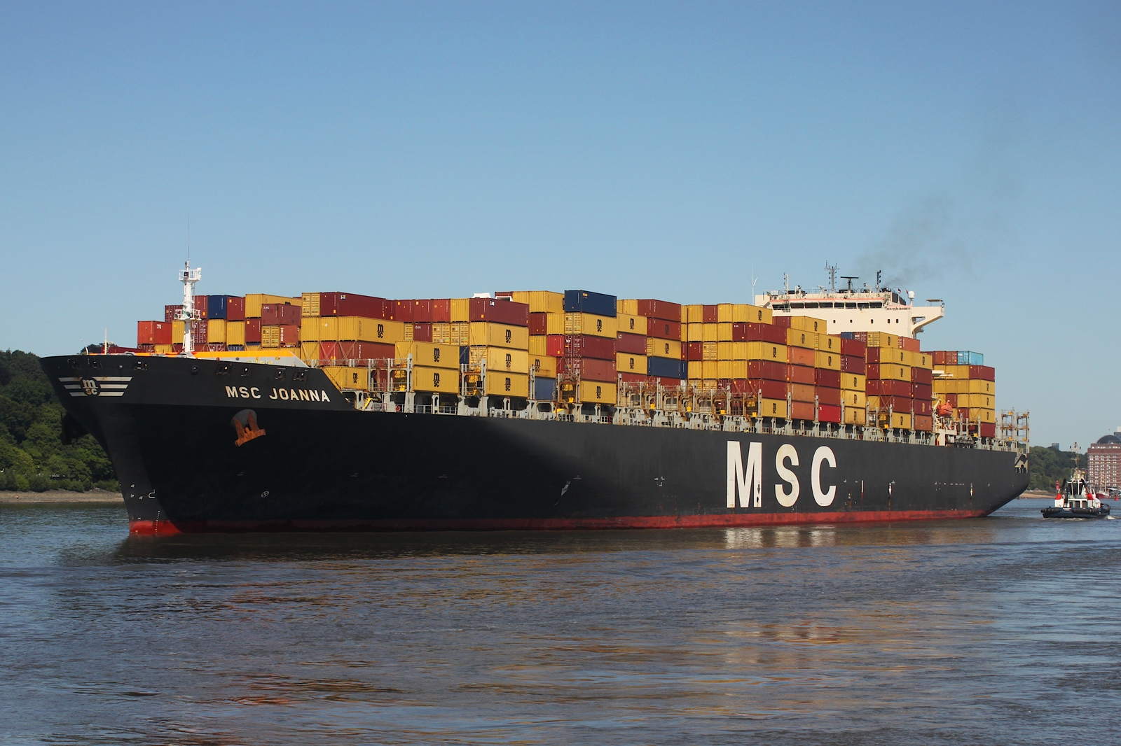 Containerfrachtschiff MSC JOANNA (IMO 9304435); Eigner/Betreiber: MSC; Datum: 01.07.2025; Aufnahmeort: Elbe/Hafen Hamburg, Deutschland. Das Bild zeigt die MSC JOANNA vom Bubendey Ufer aus betrachtet. Containerfrachtschiff MSC JOANNA (IMO 9304435); Eigner/Betreiber: MSC; Datum: 01.07.2025; Aufnahmeort: Elbe/Hafen Hamburg, Deutschland. Das Bild zeigt die MSC JOANNA vom Bubendey Ufer aus betrachtet.