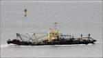 Die SEINE ist ein 1976 gebaute Schneidkopfsaugbagger (cutter suction dredger = CSD) der niederlndischen Fa. Boskalis. Die Lnge des Pontons ist 50 m, die Gesamtlnge 64 m, die Breite 11,40 m. Die Baggertiefe betrgt zwischen 2,90 und 18 m. Insgesamt sind 2.541 kw Maschinenleistung fr den Schneidkopf und die Pumpen installiert. ber einen eigenen Antrieb verfgt der Bagger nicht. Hier wird die SEINE am 19.04.2012 vom Schlepper EMS TUG (IMO 5067168) Weser abwrts gezogen.