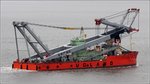 Das 1978 gebaute Kranschiff UGLEN (IMO 7721079) fährt am 02.09.2016 Höhe Bremerhaven weserabwärts. Die UGLEN ist 78,55 m lang und 26,03 m breit, der Kran hat eine Hebekraft von 600 t. Heimathafen ist Grimstad (Norwegen).