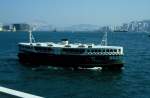 Eine Star Ferry Personenfhre (die Twinkling Star), die zwischen Kowloon und Hong Kong Island hin und her fhrt im November 1988