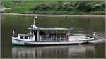 Die LENA wurde 1927 gebaut und verrichtet noch immer ihren Dienst als Personenfähre auf der Elbe bei Schmilka. Sie ist 14,5 m lang und bietet auf Kurzstrecken 90 Personen Platz. Ob die ursprünglich eingebaute Dampfmaschine mit 35 PS Leistung noch im Einsatz ist, wage ich zu bezweifeln, habe aber keinerlei Informationen darüber gefunden. Daher habe ich sie unter den Motorschiffen einsortiert. Bis 1935 fuhr sie unter dem Namen KOLIBRI. Gemeldet ist sie in Bad Schandau.
13.08.2014