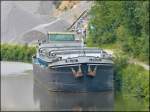 Aus einem Zug herraus habe ich dieses Frachtschiff  MARVIN  fotografiert, es liegt am Ufer des Flusses Sambre zwischen Landelies und Marchienne-Zone. 23.06.2012