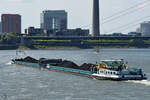 Der mit Kohle beladene Schubverband  Nomadisch  (02323635) und  Nomadisch-II  (02323636) auf dem Rhein.