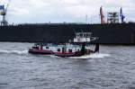 Das Schubschiff SSS 2707 ist alleine elbabwrts unterwegs. Aufgenommen am 13.06.2008 in Hamburg vor dem Dock 11 von Blohm + Voss.