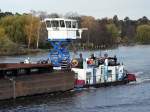 Schubboot 2334 (ex Binnenreederei) aus Hohen Neuendorf bei Berlin. Hier auf der Dahme-Wasserstrasse mit einem leeren Prahm fr die Braunkohlebeladung in Knigs Wusterhausen./15.11.2006