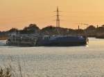 TMS Eiltank 35  ENI 04031930 - L 83.40m - B 9.50m - Tg 2.73m - T 1440 - PS 900-MWM - Bj 1963 in Geestacht./ Gemeldet in Duisburg. Abends um 21.30 Uhr zu Berg in Riesenbeck-Birgte am 23.06.2009.