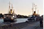 Tonnenleger  Kapitn Meyer  verlsst Rendsburg, dahinter der Dampfeisbrecher  Wal , Juli 2005