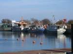 Frisch gefangener Fisch wurde gleich von den Fischerbooten im Barthöfter Hafen,am 23.Februar 2014,verkauft.
