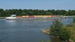 Containerschiff  Marte-Meo  Rhein-aufwärts unterwegs am Himmelgeister Rheinbogen, 26.6.2010