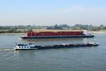 Schiffsbegegnung auf dem Rhein bei Rees am 06.07.2017. GMS Anda (02332439 , 135 x 11,45m) fährt mit Containern beladen zu Berg und das GMS Hamaritha (02323494 , 86 x 9,5m) zu Tal.