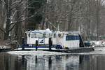 Schubboot  RHENUS STRASSBURG  (06503581 , 24,84 x 9,12m) befuhr am 13.02.2025 die  HAVEL  / Untere-Havel-Wasserstrasse bei km 3,9 in Berlin-Pichelsdorf zu Tal.