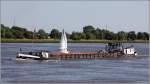 Die 1940 gebaute AMBULANT (ENI 04012230) am 01.08.2012 Weser abwrts fahrend. Sie ist 68,5 m lang, 7,1 m breit und hat eine Tonnage von 741 t. Heimathafen ist Rhaudermoor.