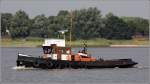 Der Schlepper WMME (ENI 05300600) wurde 1902 oder 1904 bei Jos. L. Meyer in Papenburg gebaut. L: 22,00 m, B: 6,43 m, Tg: 2,00 m. Maschinenleistung: 295 kw. Heimathafen ist Bremen. Hier ist die WMME am 01.08.2012 Hhe Nordenham Weser aufwrts unterwegs.