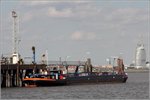 Am 27.09.2016 liegt die ACIDUM (ENI 05306400) am Industriepier in Nordenham-Blexen. Im Hintergrund - auf der anderen Weserseite - ist das Sail City Hochhaus in Bremerhaven zu sehen. Die ACIDUM wurde 1937 gebaut, ist 67,16 m lang, 8,20 breit und hat eine Tonnage von 521. Heimathafen ist Bonn. Frühere Namen: I.G.5, FRITZ HABER, VTG 96, VTG GAS 96.