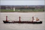Der 1985 gebaute Holzfrachter AMSTERDAM (IMO 8311053) am 11.11.2008 Weser aufwrts fahrend. Die AMSTERDAM ist 111 m lang, 16 m breit und hat eine GT von 4080. Sie fhrt unter der Flagge der Bahamas.