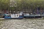 Schubboot LI Tore, ENI 06001929, L 16,67 m, B 7,57 m, schleppt ein Hausboot auf der Maas in L�ttich ab. 17.09.2026