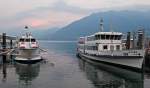 Lago Maggiore: Ein Tragflchenboot und die MS Milano liegen im Hafen von Locarno vertut, whrend die Schweizer Fussball-Nationalmannschaft sich in Sdafrika mit einem 0 : 0 gegen Honduras von der WM verabschiedet (25.06.2010 21:08h)