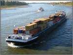 Das Containerschiff  Mejana  ist am 14.10.2007 auf dem Rhein in Düsseldorf rheinaufwärts unterwegs.